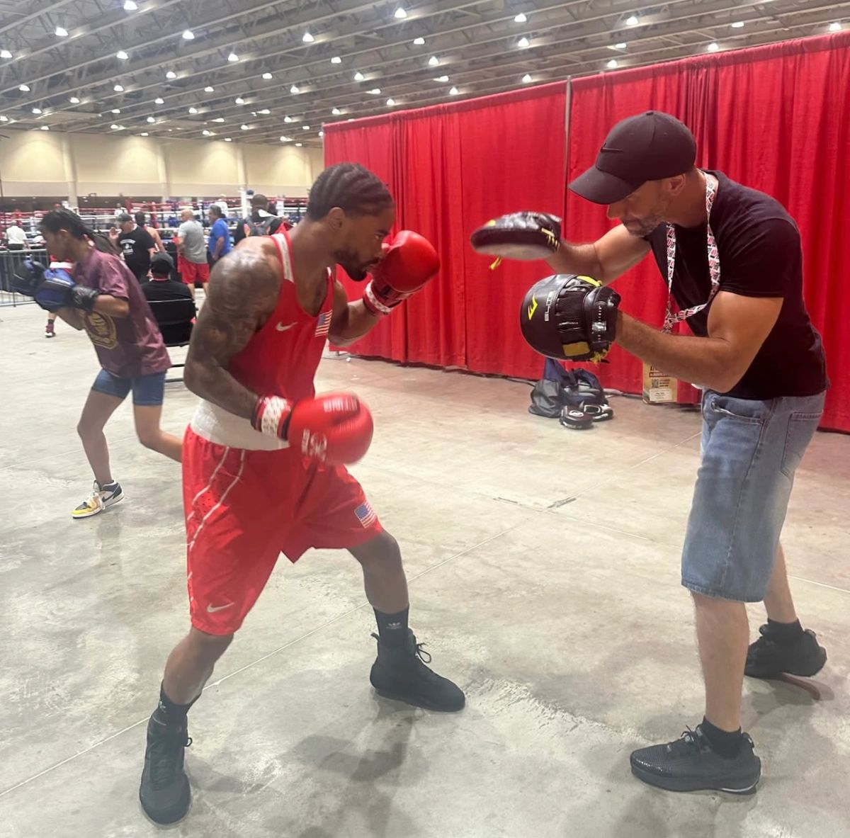 Young fighter sparring in the ring