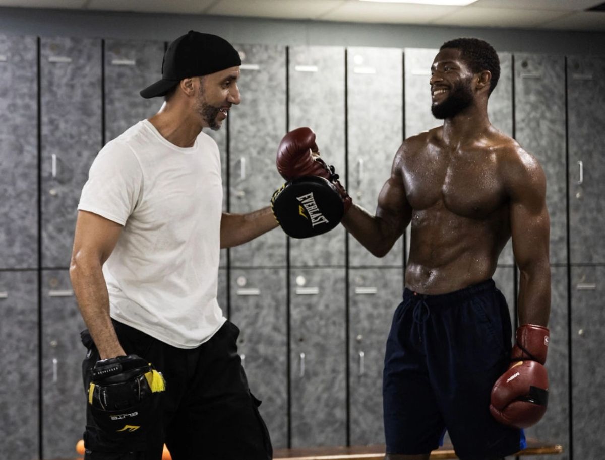 Coach and fighter, gloves up